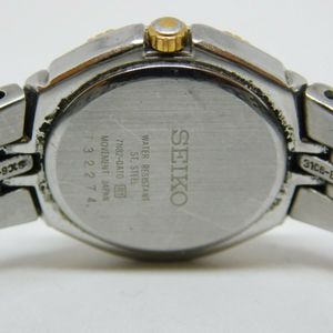 Seiko 7N82-0AT0 Two Tone Quartz Analog Ladies Watch | WatchCharts