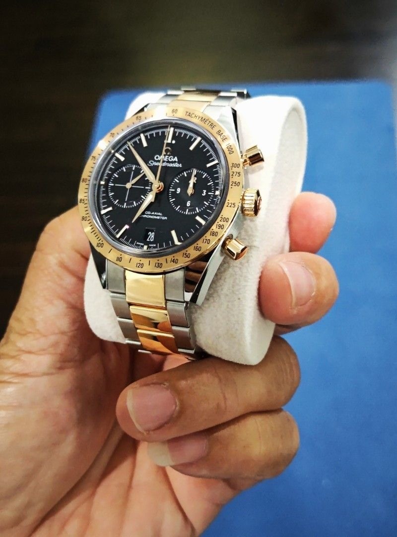 Omega speedmaster cheap 57 gold