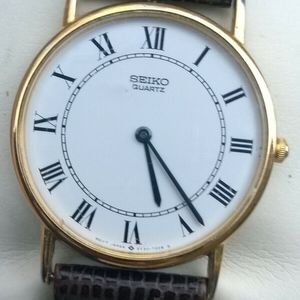 Seiko Mens Vintage Classic Quartz Watch - 5Y30-7000 | WatchCharts