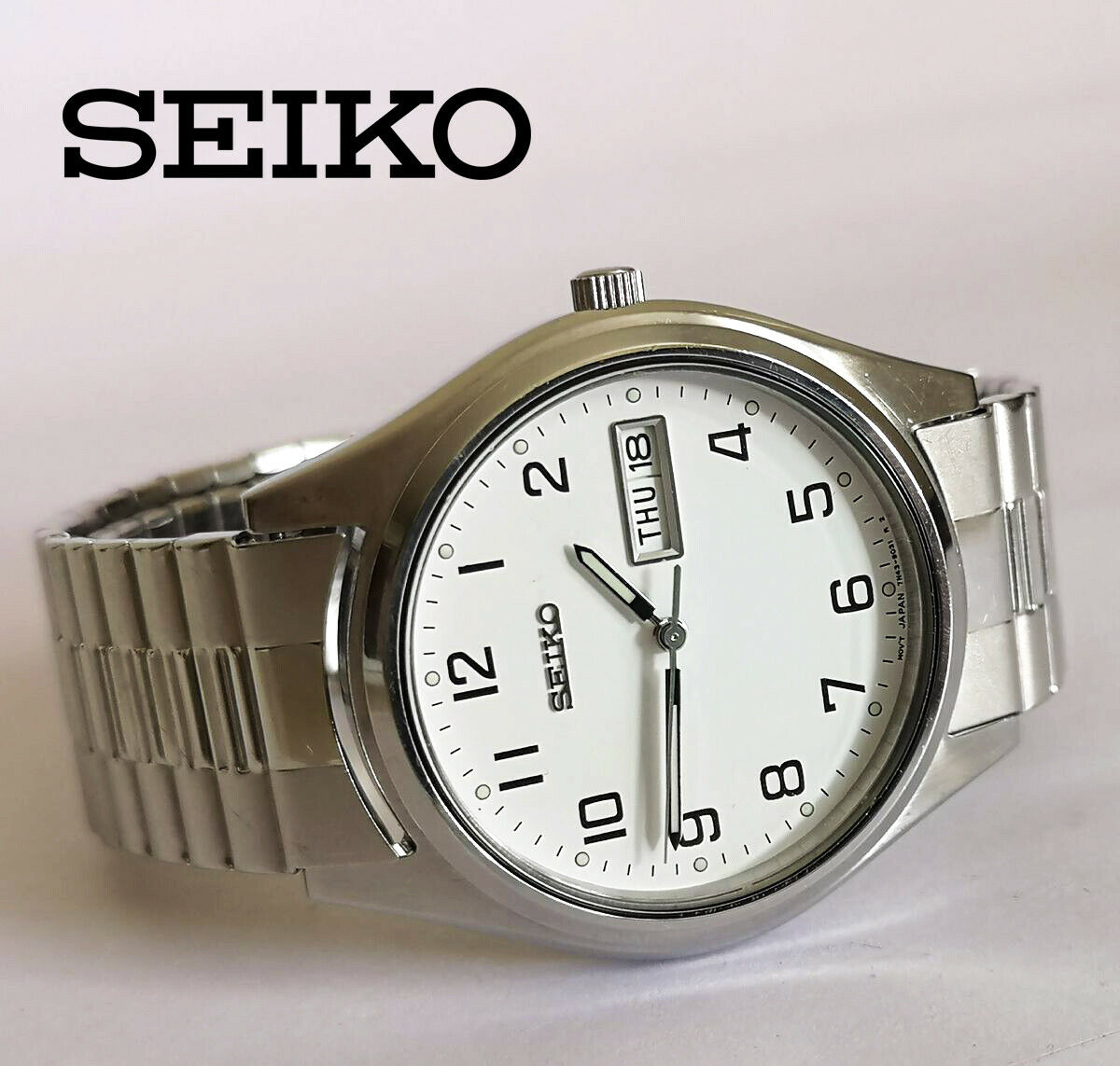 Vintage 1995 Seiko 7N43-9011 men's quartz watch day date stainless steel |  WatchCharts