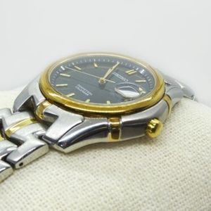 Seiko Perpetual Calendar Two-Tone Men's Watch 8F32-0189 | WatchCharts