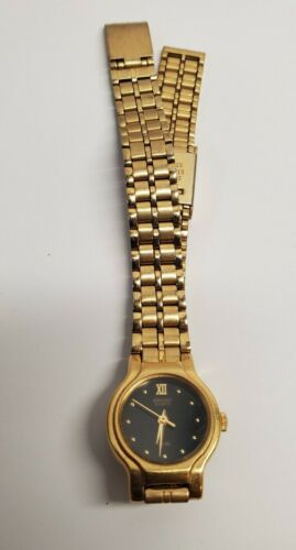 VINTAGE SEIKO SX WOMEN'S GOLD TONE BLACK DIAL QUARTZ WATCH V401