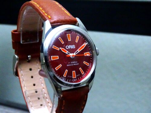 VINTAGE ORIS MECHANICAL WINDING WATCH. Red Orange White Dial