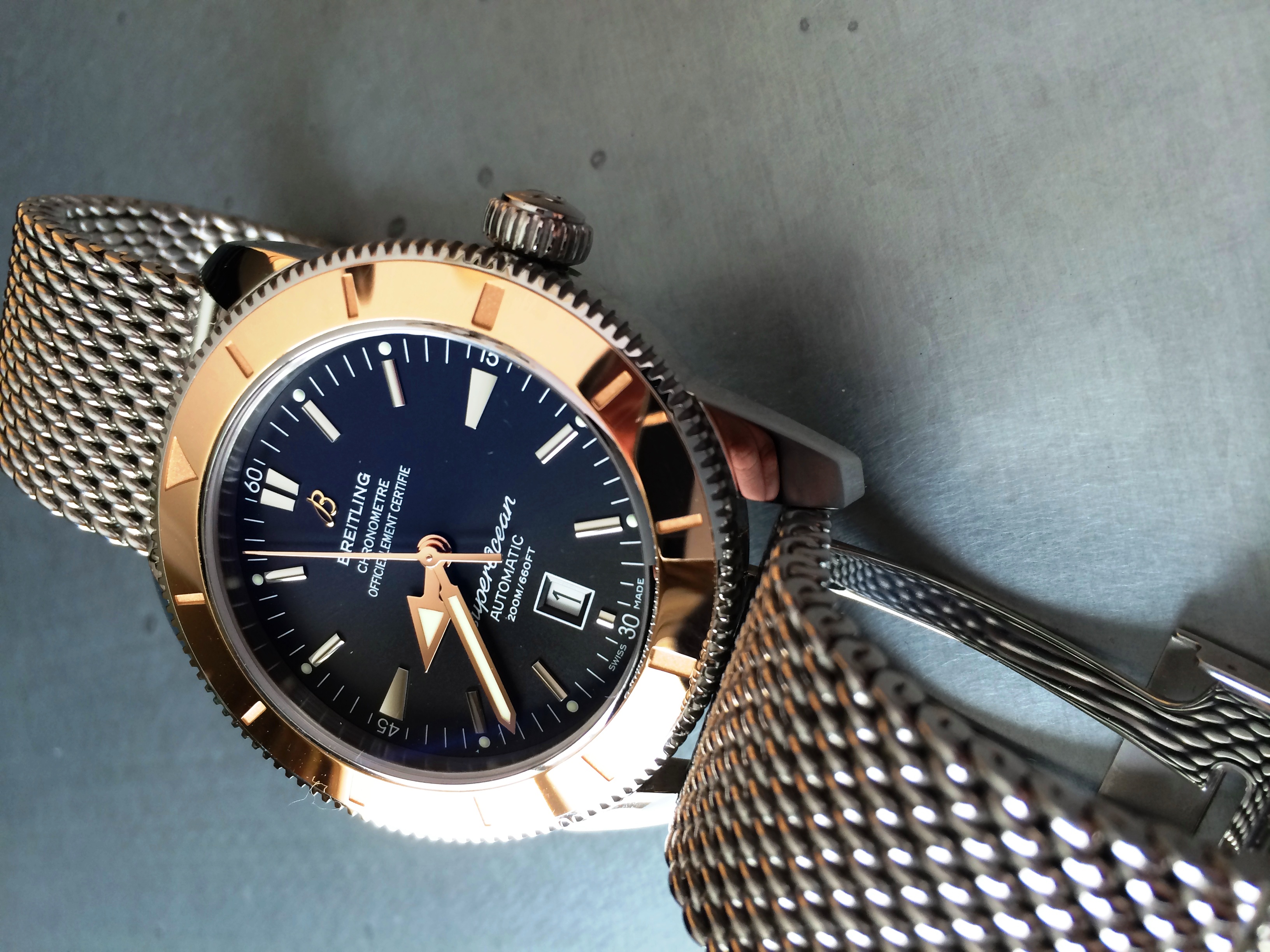 Breitling superocean hotsell gold bezel