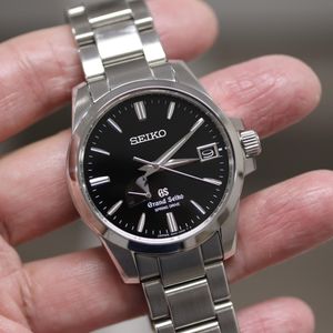 Grand Seiko Spring Drive SBGA027 Price as of May 2026 | WatchCharts