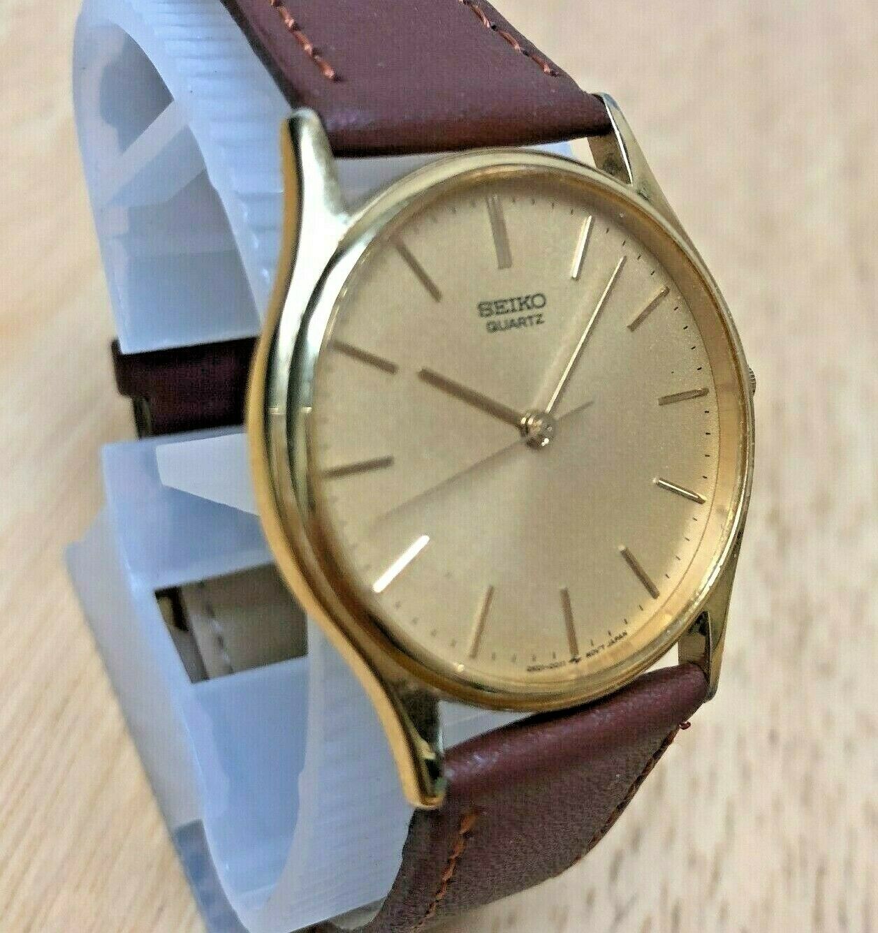 Vintage Seiko 2K01 0011 Men Gold Tone Leather Analog Quartz Watch