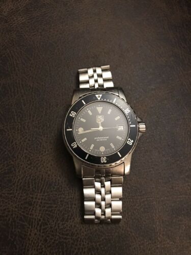 TAG HEUER 1500 SERIES 929.206G 20 PROF BLACK DIAL 200M STAINLESS