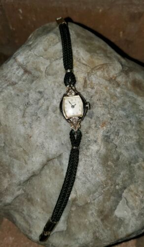 Vintage Bulova Ladies Wrist Watch Black Cord Band. Works Excellent