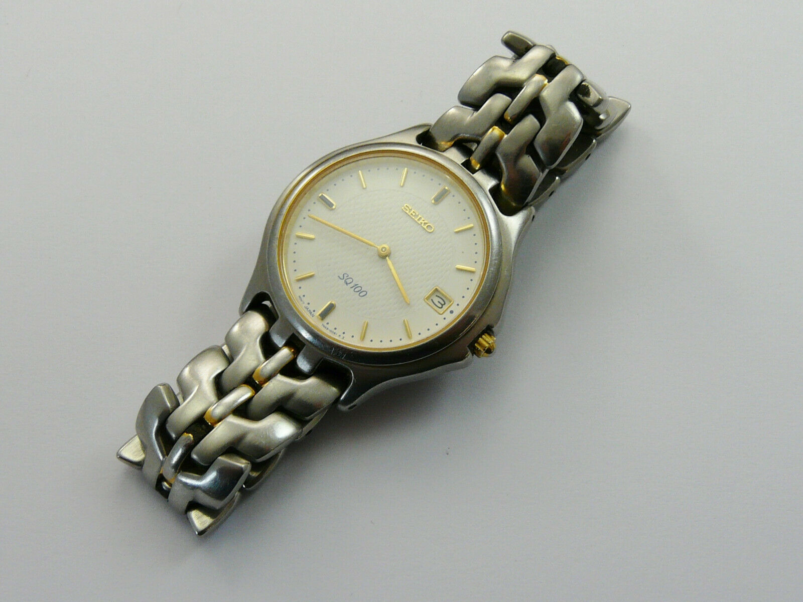 VINTAGE c2000 SEIKO SQ100 7N49-0040 GENTS QUARTZ WATCH GWO