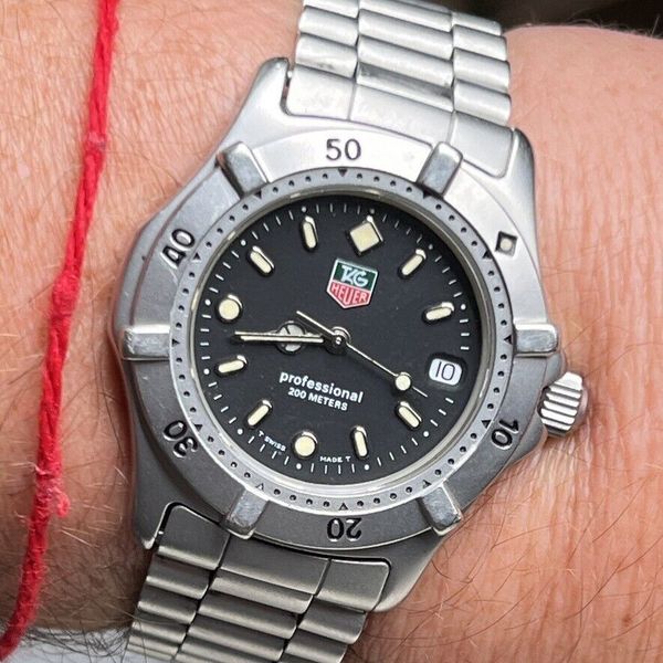 TAG HEUER Professional 200m WE1210-R Black Dial Bracelet Rotate