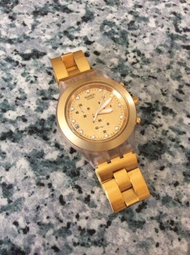 Swatch irony diaphane patented water resistant golden wristwatch