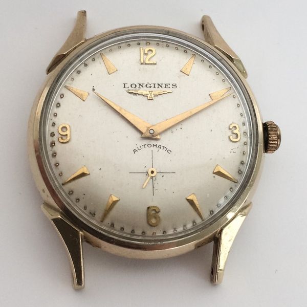 SOLD 1950s Longines cal.19a Automatic Fancy Lugs DROPPED | WatchCharts