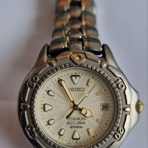 Men's SEIKO TITANIUM Watch - 100 M - V732-0P30 | WatchCharts